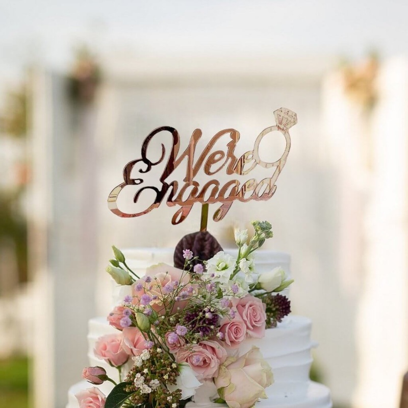 Acrylic Rose Gold 'We're Engaged' Diamond Ring Cake Topper